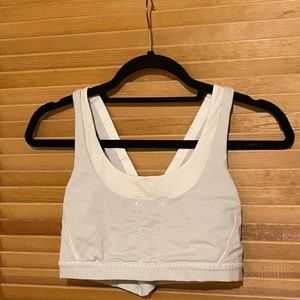 Grey and white striped lululemon sports bra with a cross back